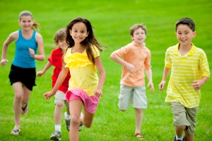 A group of diverse children playing outside.